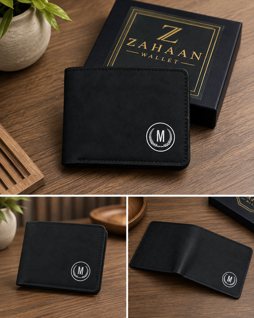 Black faux-leather bifold wallet with a white circular monogram logo, shown closed next to its branded black gift box on a wooden tabletop. Three smaller views at the bottom show the wallet from different angles.